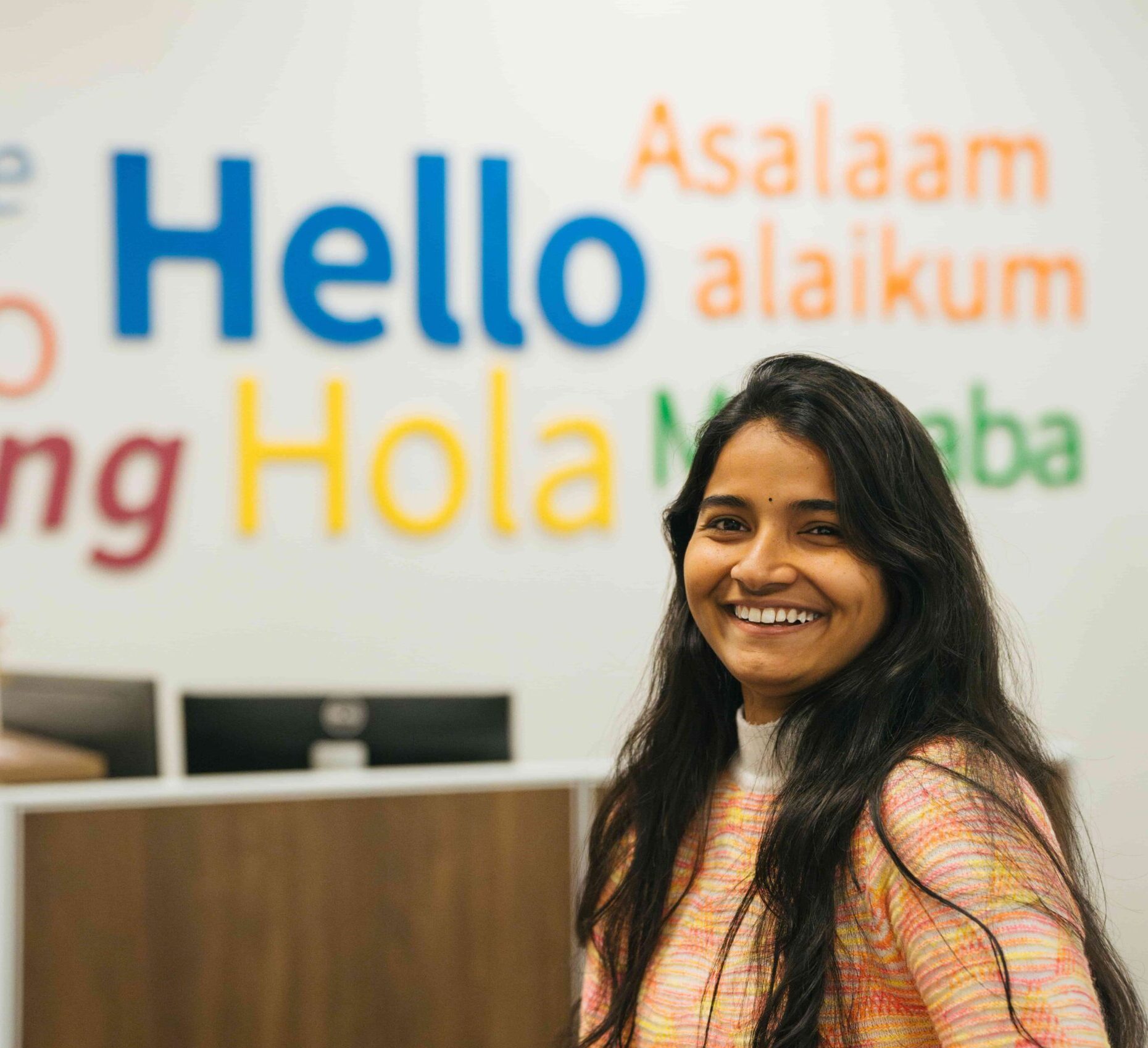 international female student looking at the camera and smiling