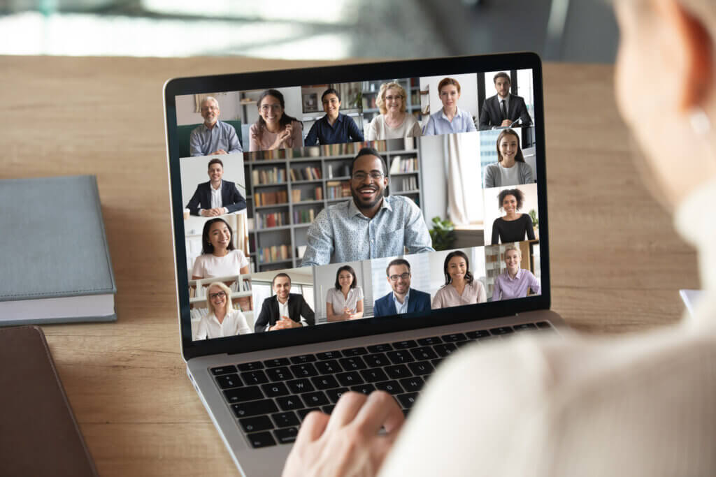 Photo of laptop screen showing online meeting