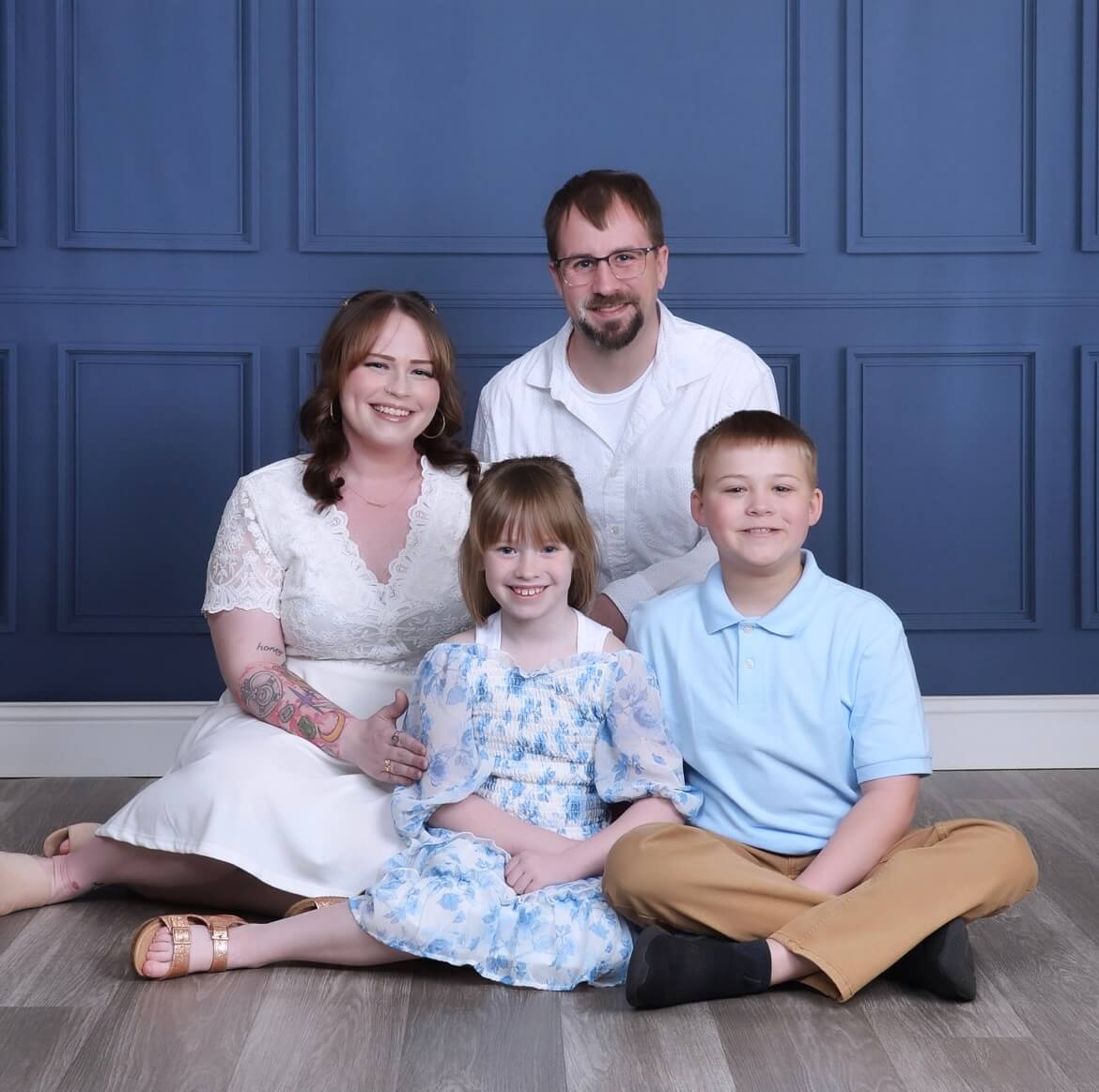 Liz Ooten with her husband and two children